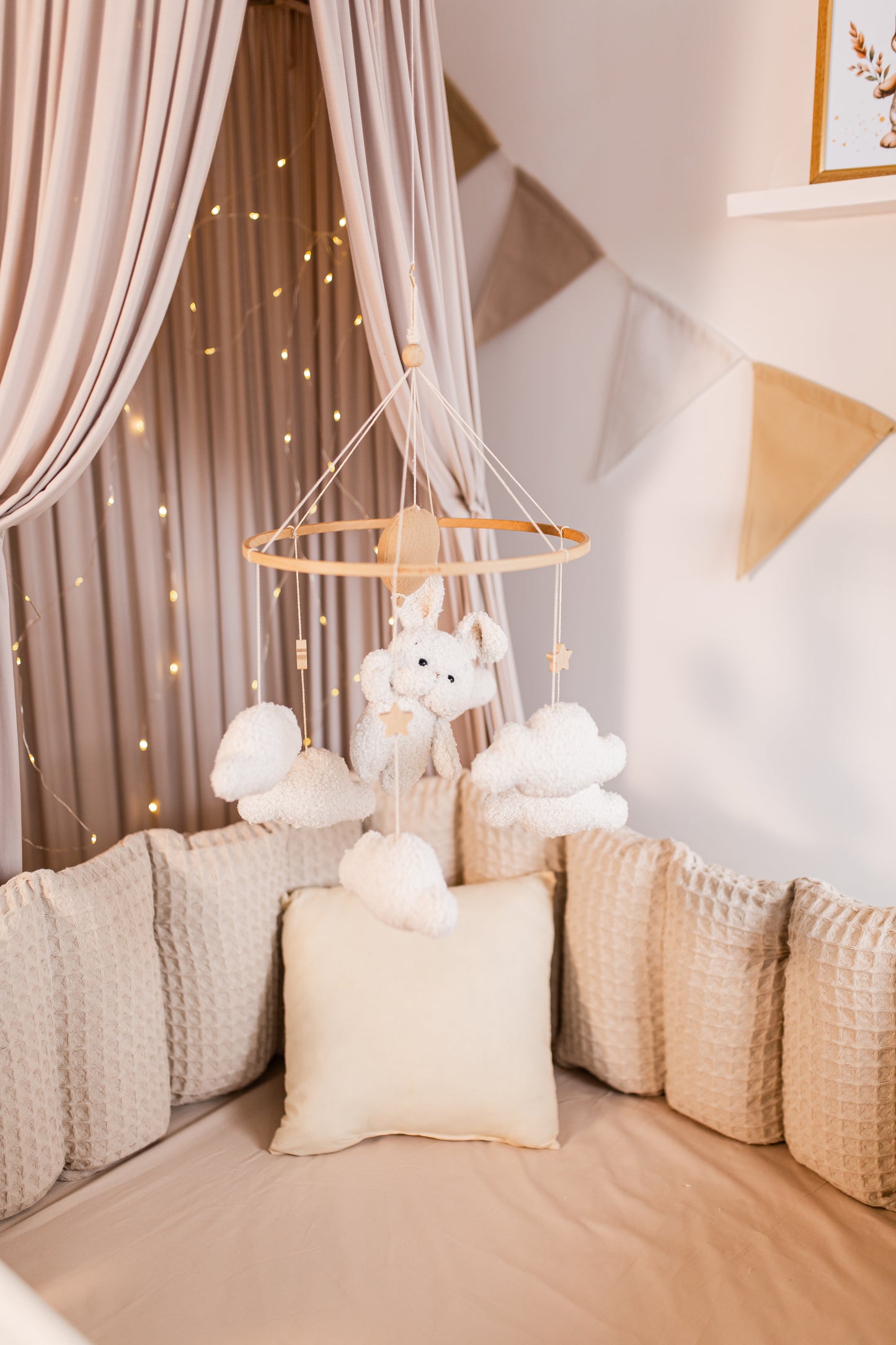 Handmade boucle balloon bunny mobile in soft whimsical tones