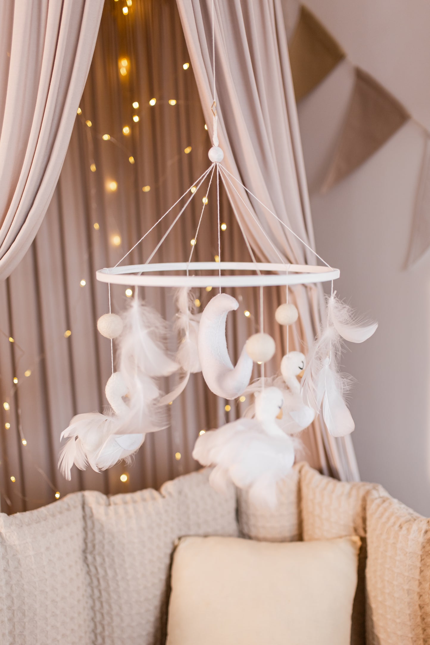 Eco-friendly boucle swan mobile for serene nursery ambiance