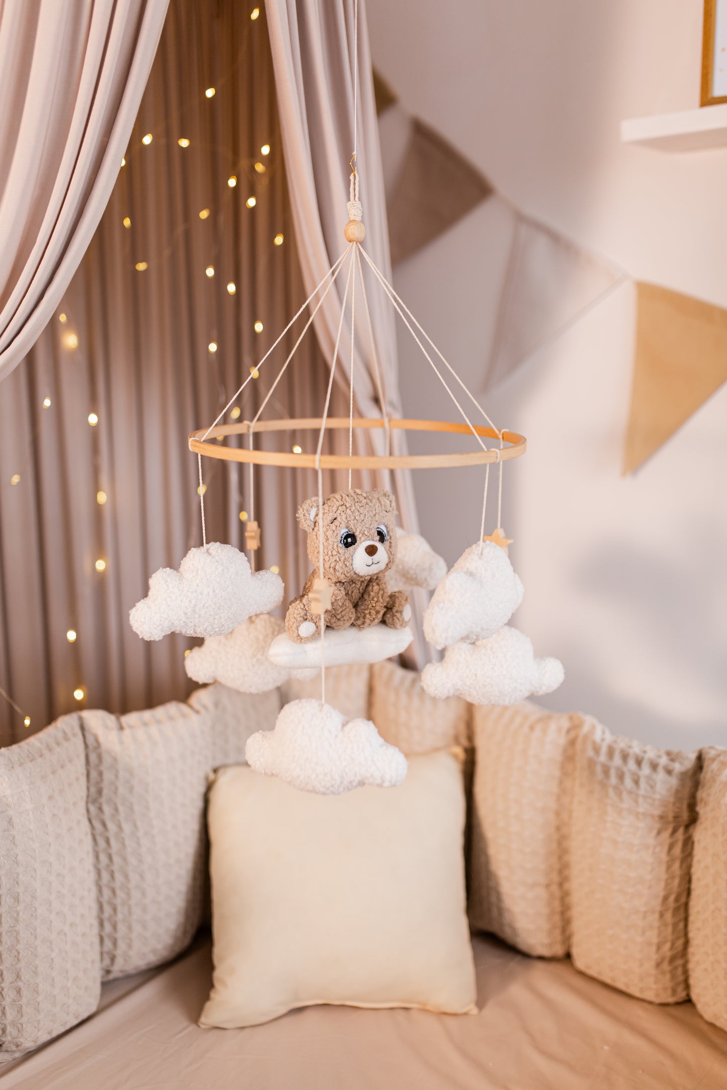 Handmade boucle bear nursery mobile floating among stars and clouds